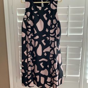 Black dress with pops of geometric shapes